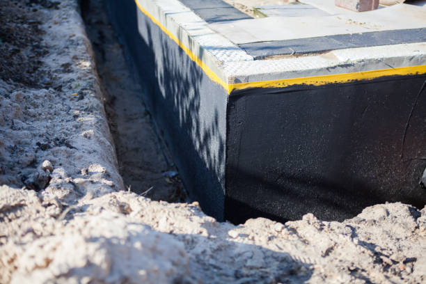 Professional Waterproofing technician working in Tenafly, NJ